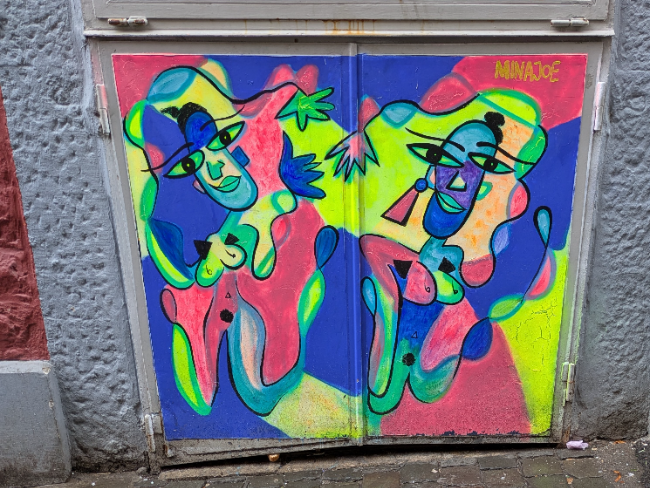 Neon women street art by MinaJoe