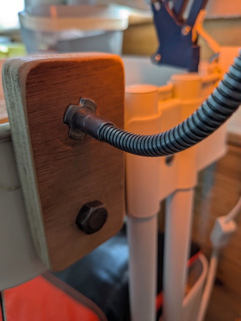 Gene!: detail of a water bottle lamp mounting point