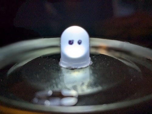Lyle! a tiny lamp which you press down on a syrup can lid to turn on